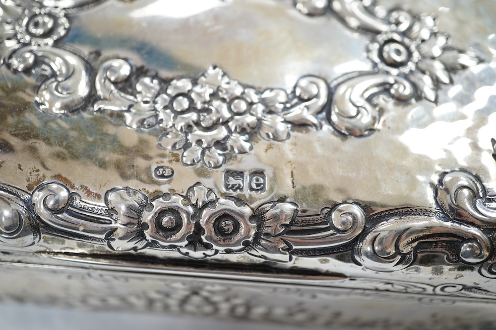 A late Victorian embossed silver rectangular trinket box (converted from a cigarette box), Joseph Braham, London, 1900, 17.5cm. Condition - fair to good